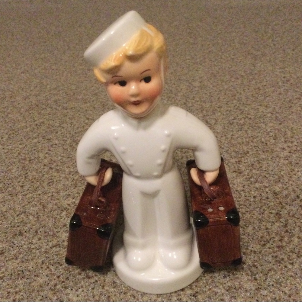 Vintage Porcelain Figurine “The Bell Hop”